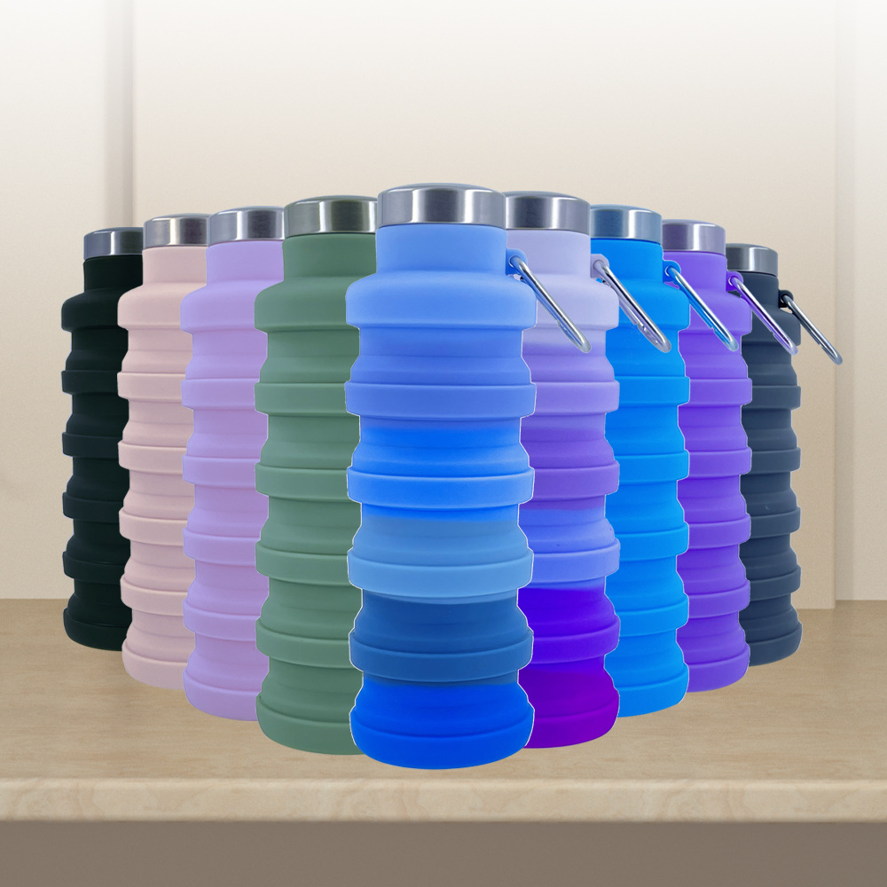 Collapsible silicone water bottles lineup in multiple colors with metal lids and pull loop handles