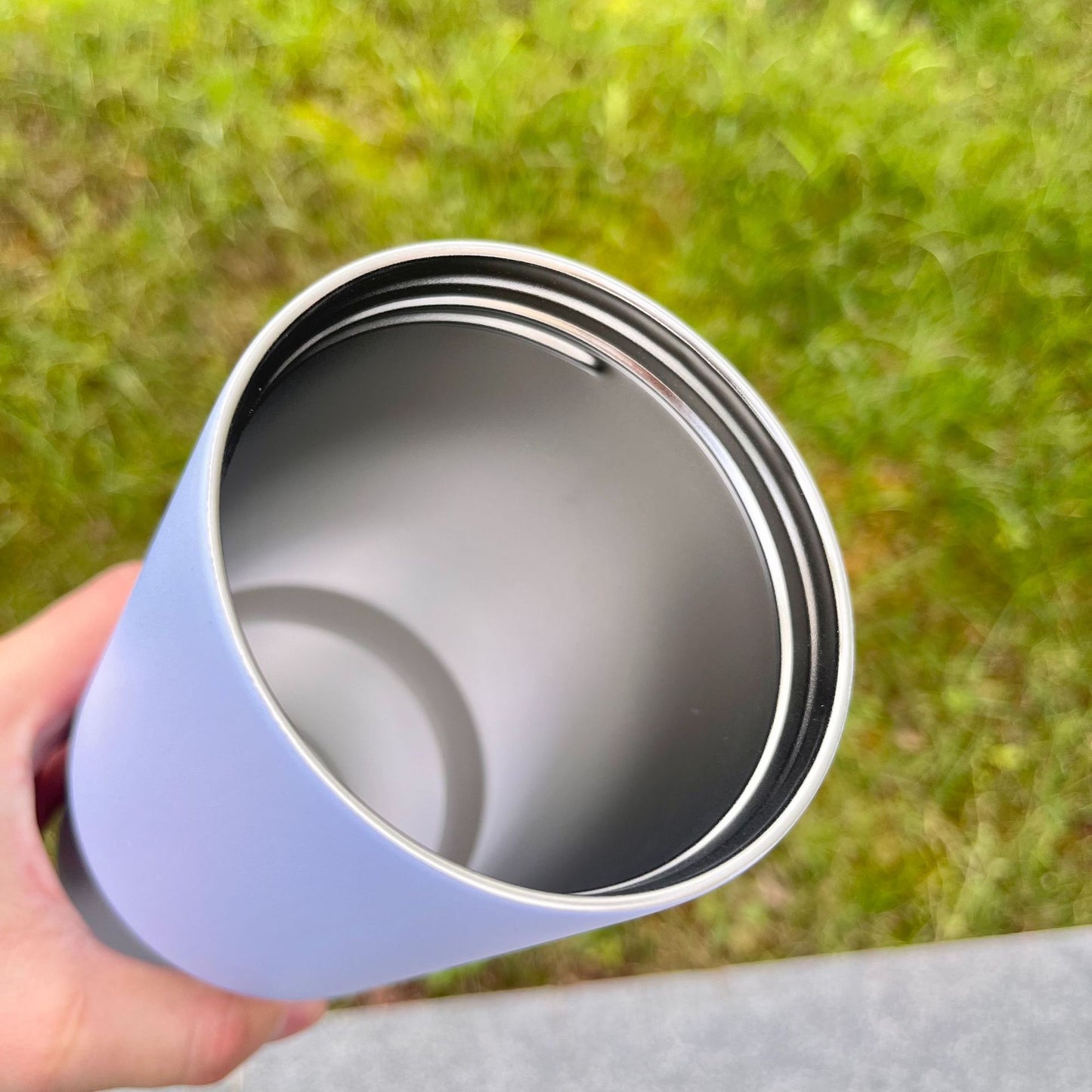 Light blue insulated bottle opening with inner stainless steel wall
