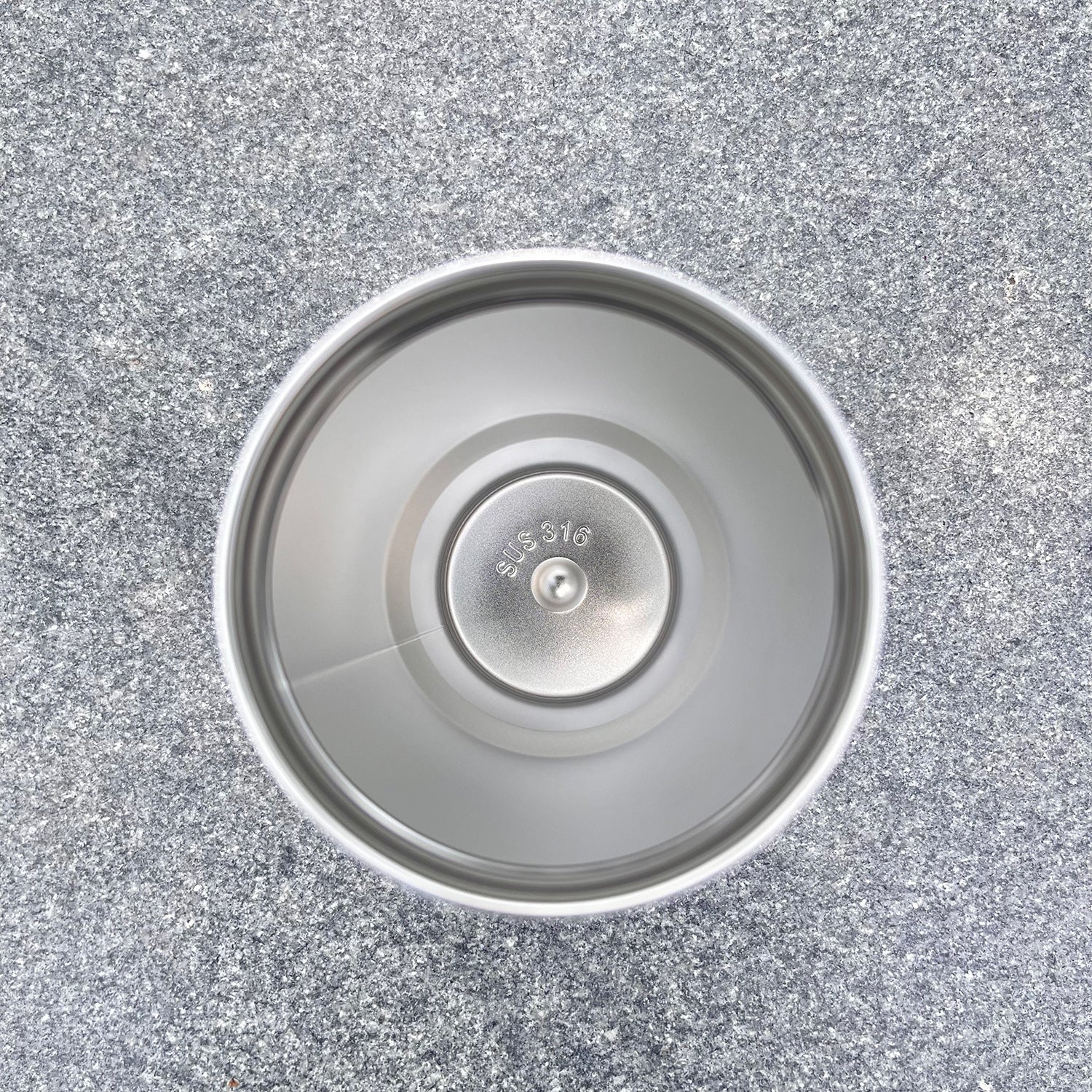 Stainless steel insulated bottle bottom labeled SUS316