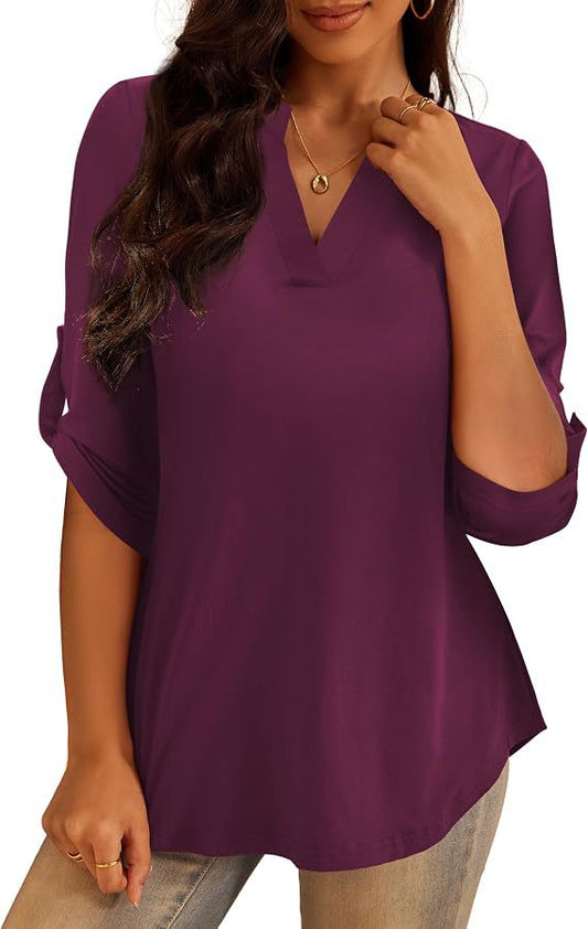 Plum purple split V-neck tunic top with elbow-length sleeves and slightly flared hem