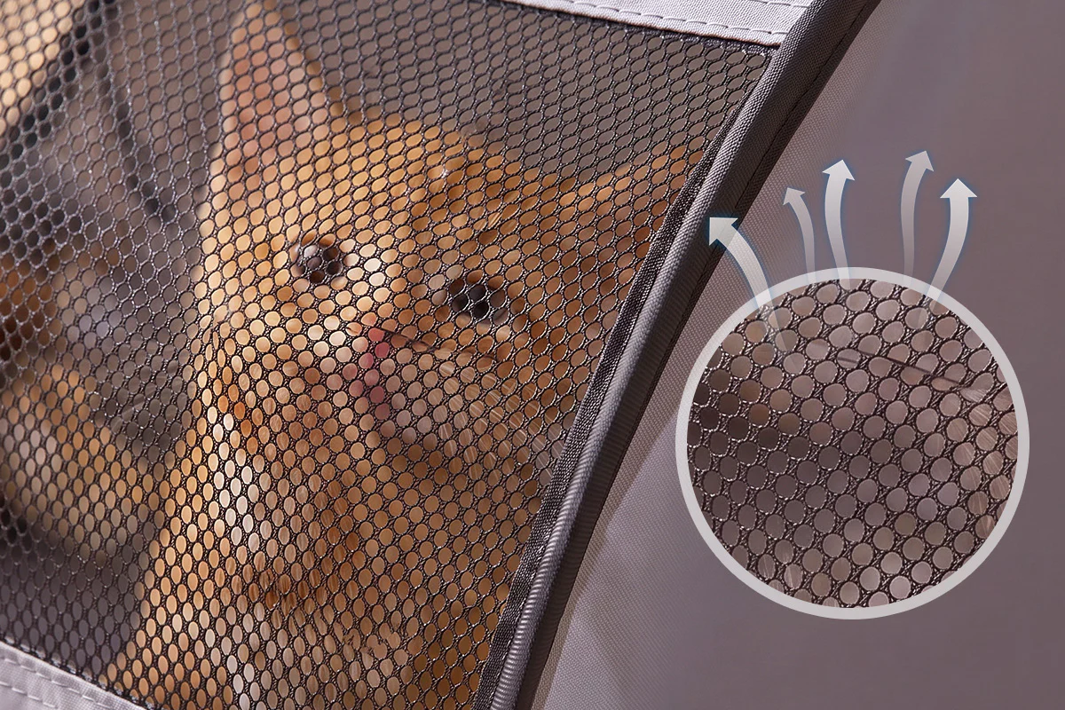 Gray mesh side panel with circular ventilation window on pet playpen tent.