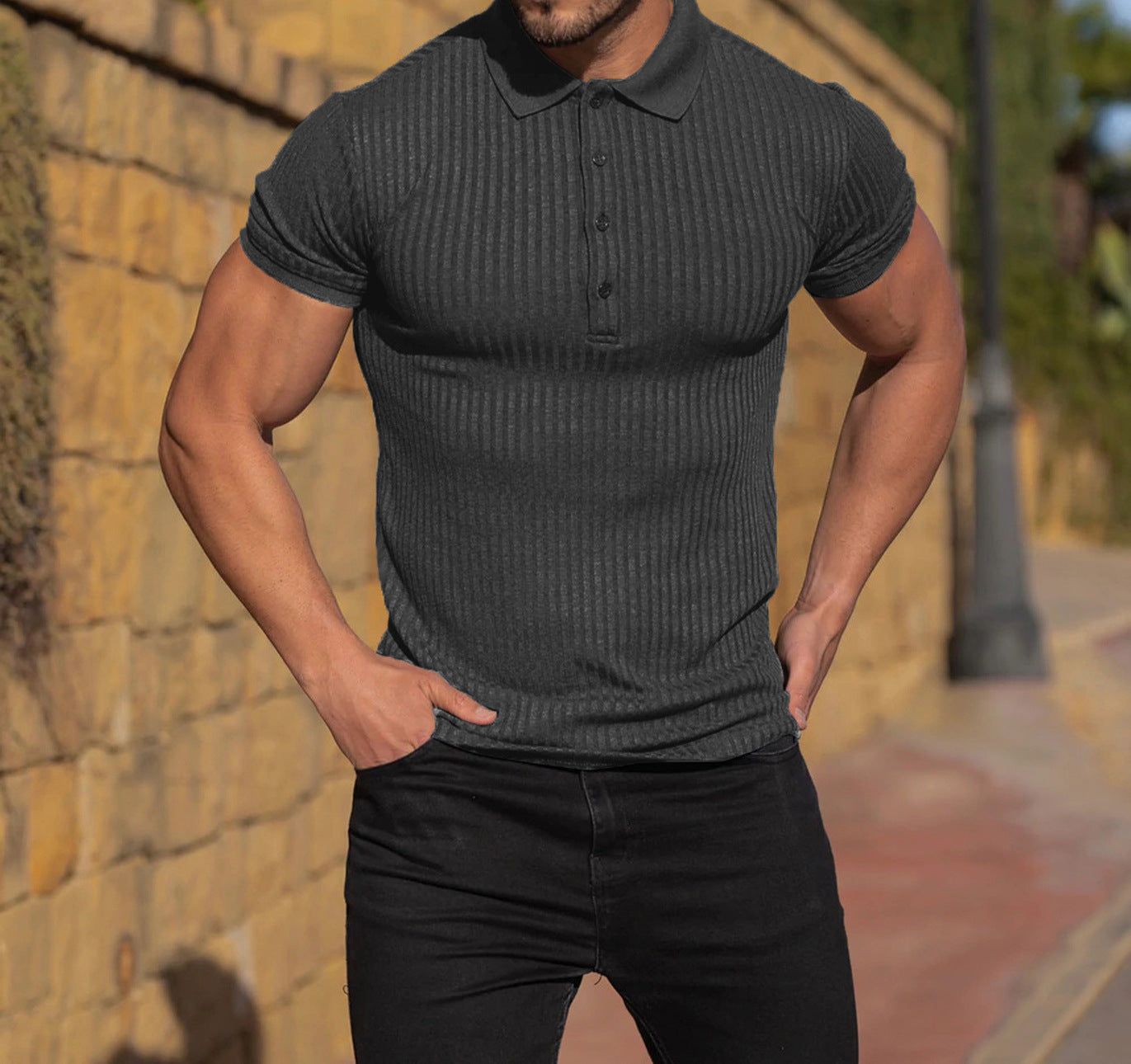Men's vertical ribbed stretch polo shirt in black, short sleeves, button placket, collared neck