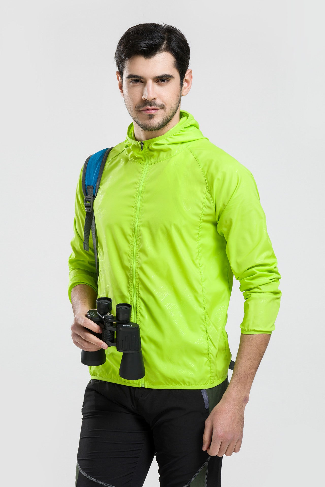 Hooded sun protection jacket in neon green with zip front and hood