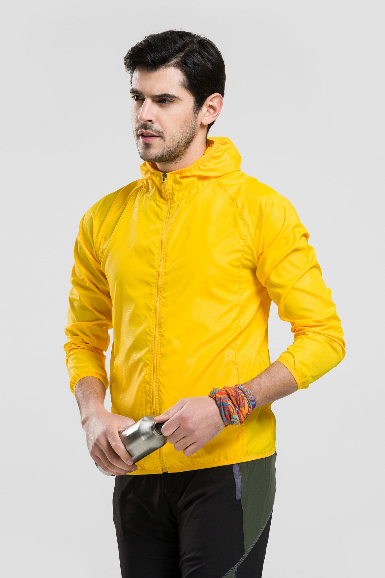Hooded sun protection jacket in bright yellow with full-length front zipper