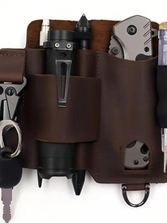 Brown leather tool waist pouch close-up with front pockets, tool slots, and key ring