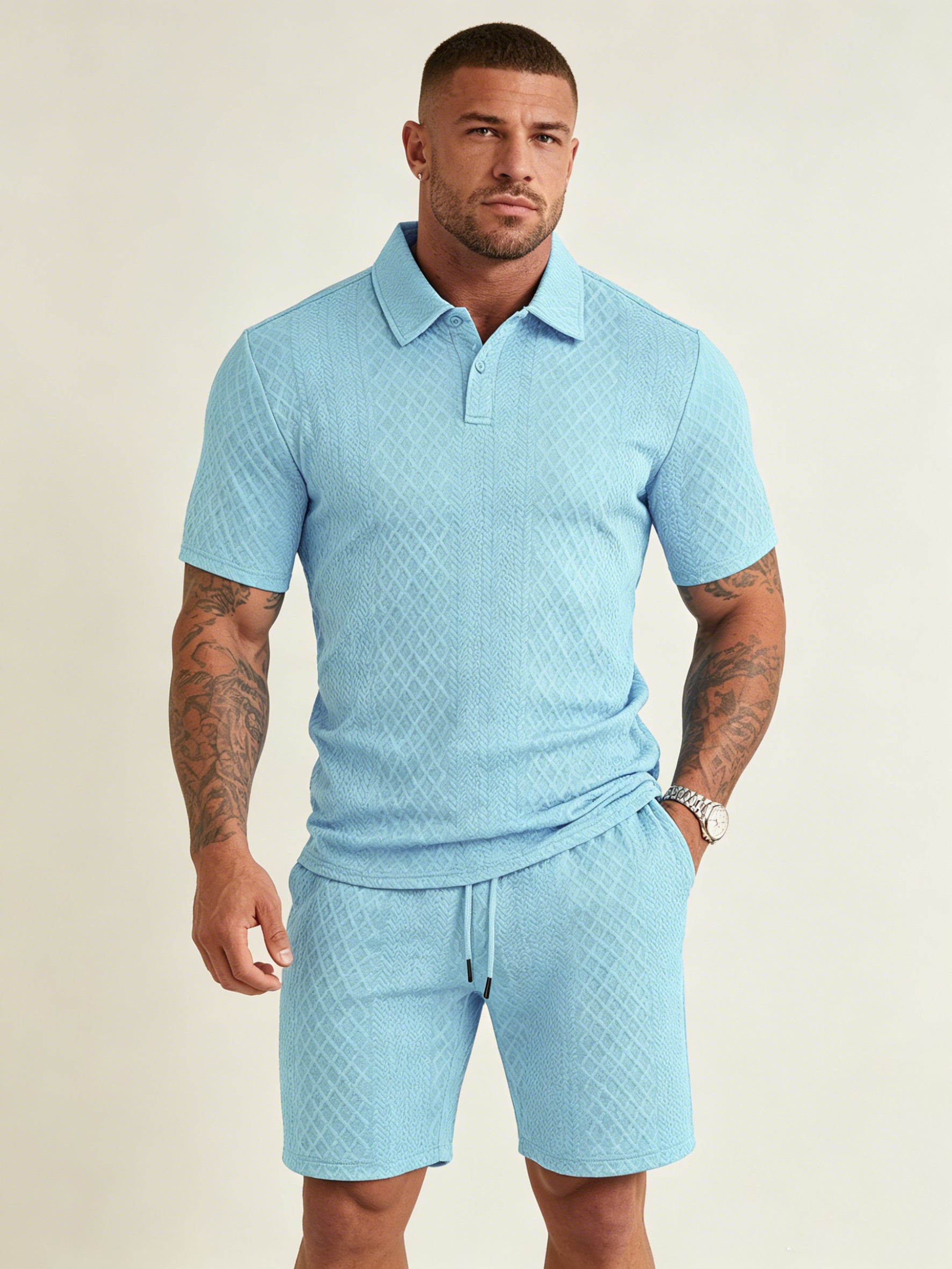Men's textured polo and matching shorts set in light blue, button-front short-sleeve polo