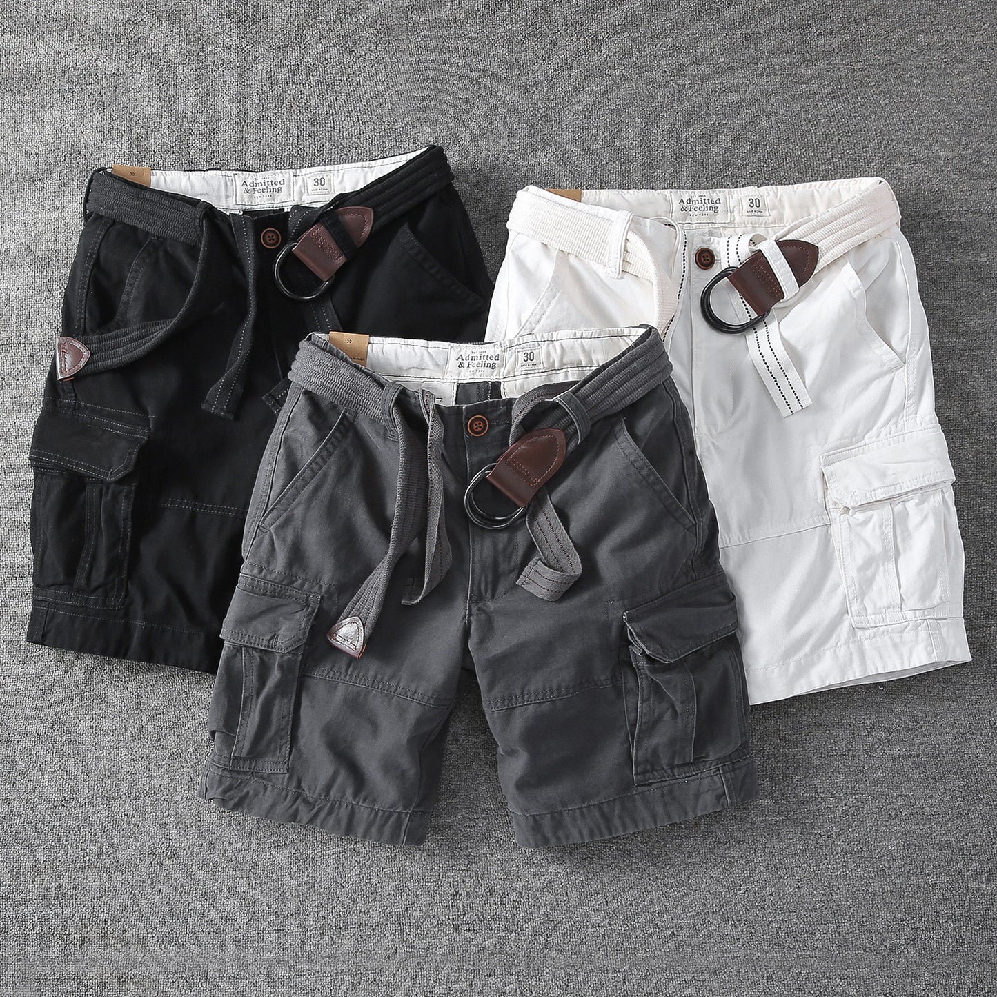 Men's relaxed-fit outdoor shorts in black, gray, and white with cargo pockets