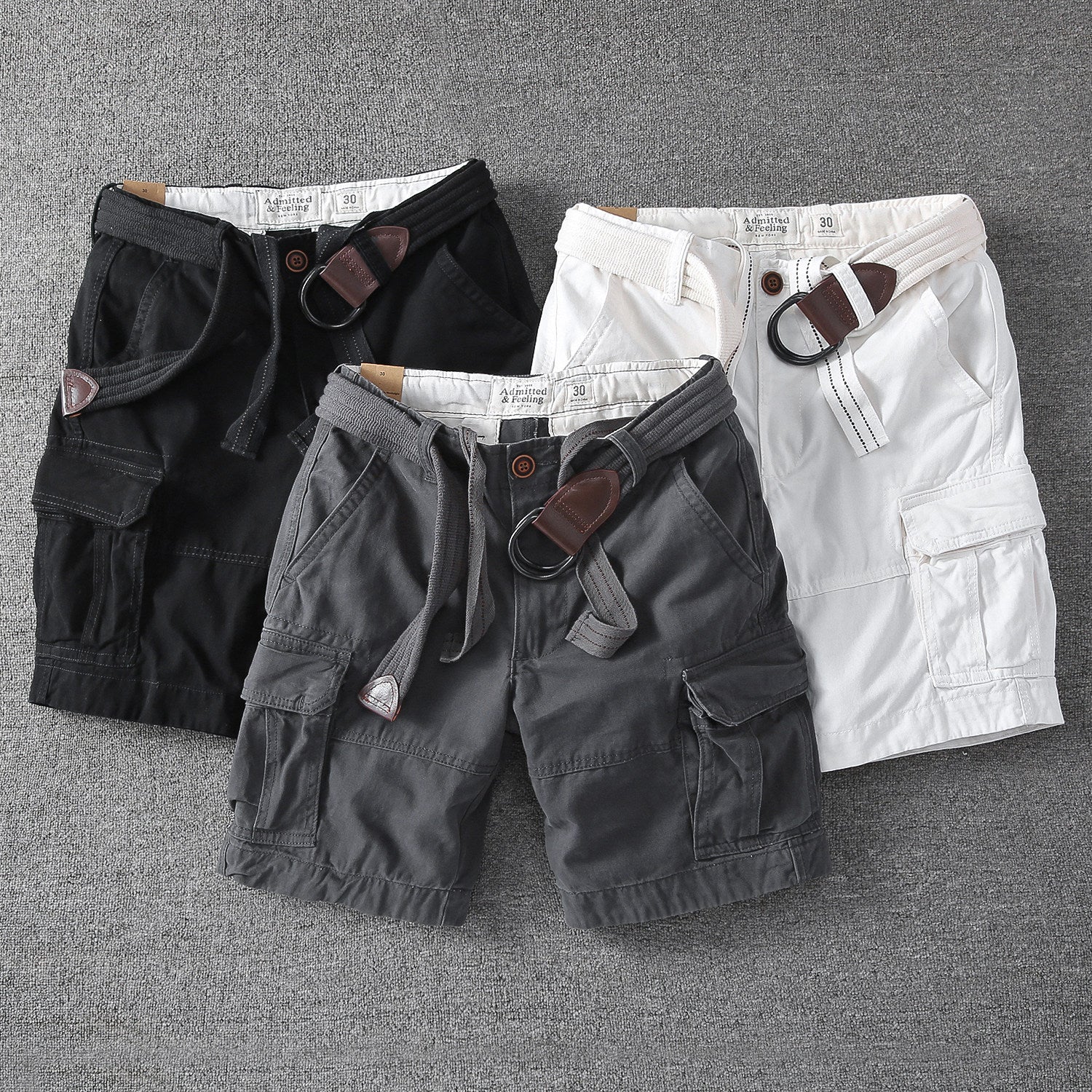 Men's relaxed-fit outdoor shorts in black, gray, and white with cargo pockets