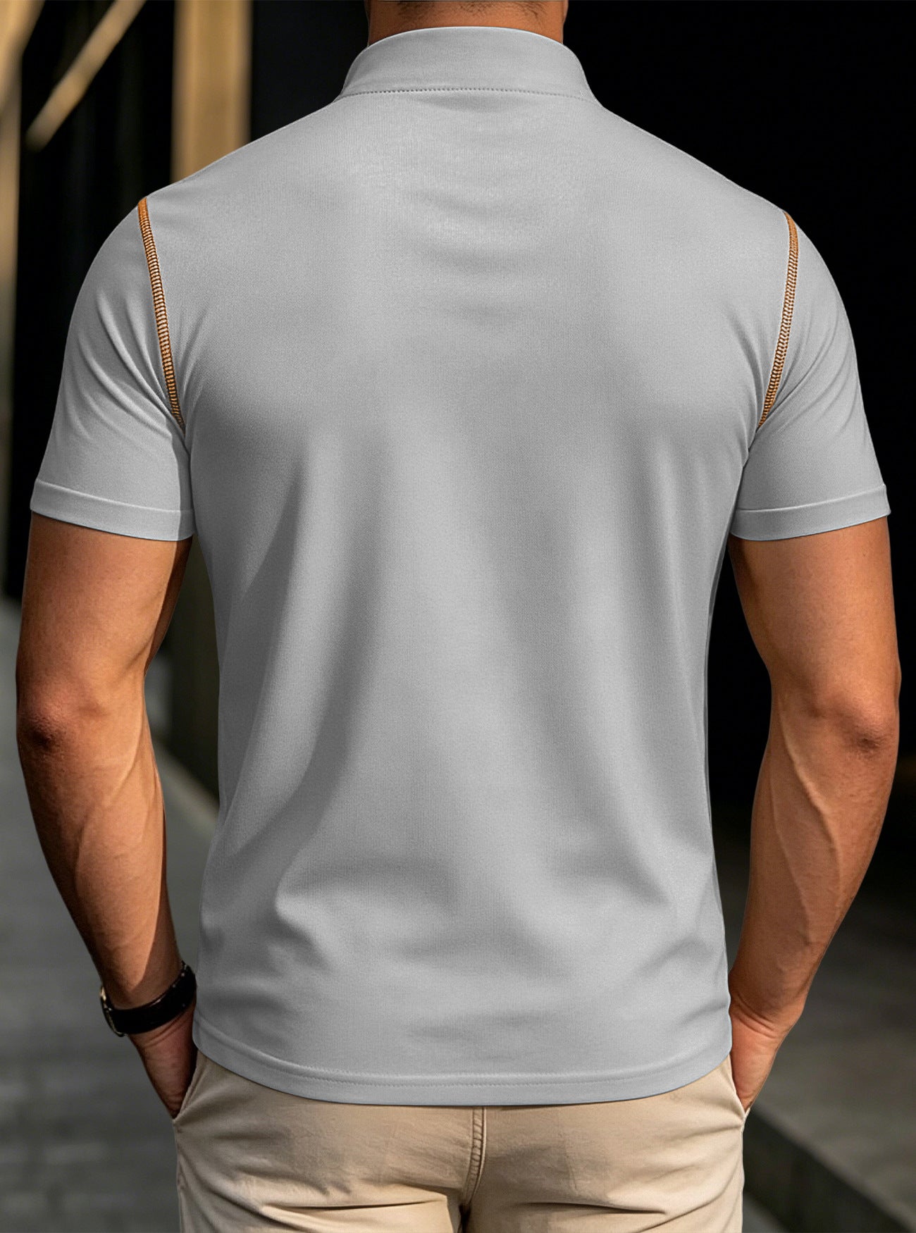 Men's light gray stand-collar henley polo shirt, back view with tan shoulder trim