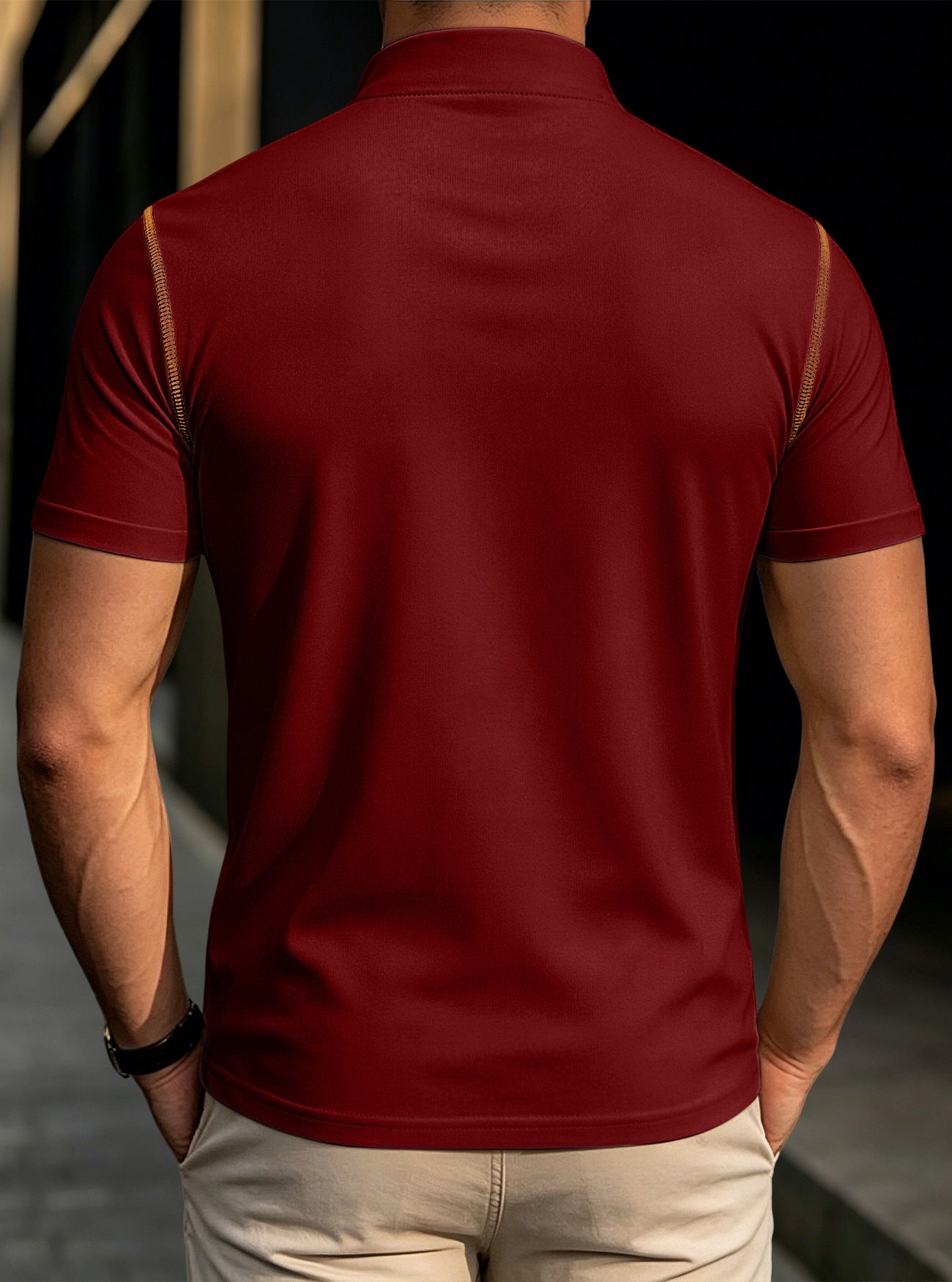 Men's red stand-collar henley polo shirt, back view with tan shoulder trim