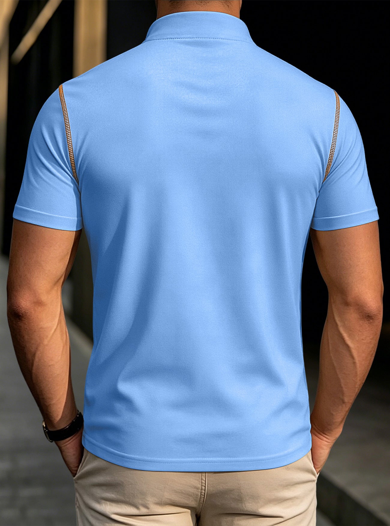 Men's light blue stand-collar henley polo shirt, back view with tan shoulder trim