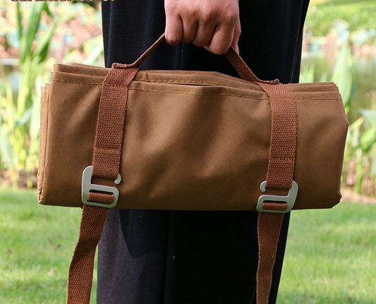 Brown waterproof picnic and camping mat carry bag with two adjustable shoulder straps.
