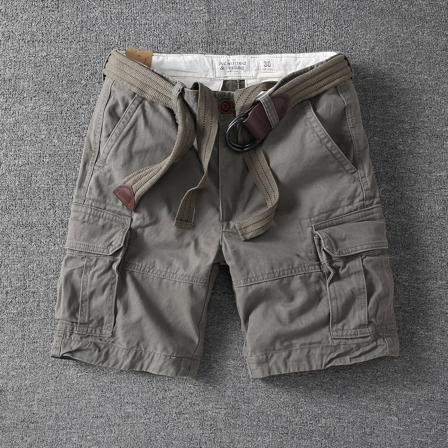 Men's relaxed-fit outdoor shorts in light gray with drawstring waist and cargo pockets