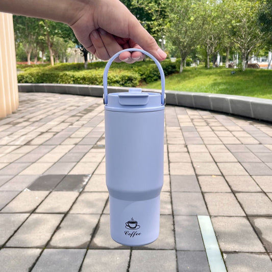 Portable stainless steel insulated bottle, light blue, with carry handle and flip lid