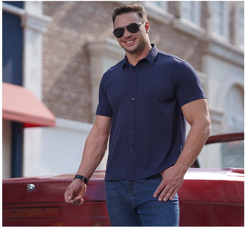 Navy men’s short-sleeve button-up business shirt with a pointed collar