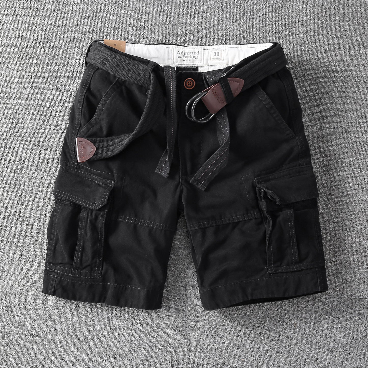 Men's relaxed-fit outdoor shorts in black with drawstring waist and cargo pockets