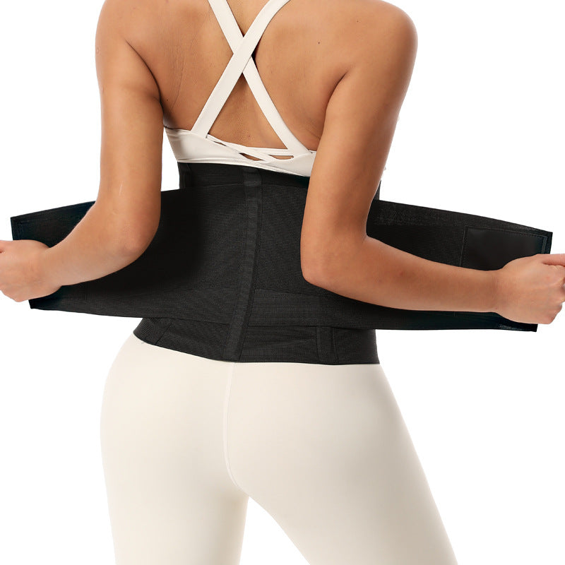Black waist trainer with crisscross back support straps and front band panels