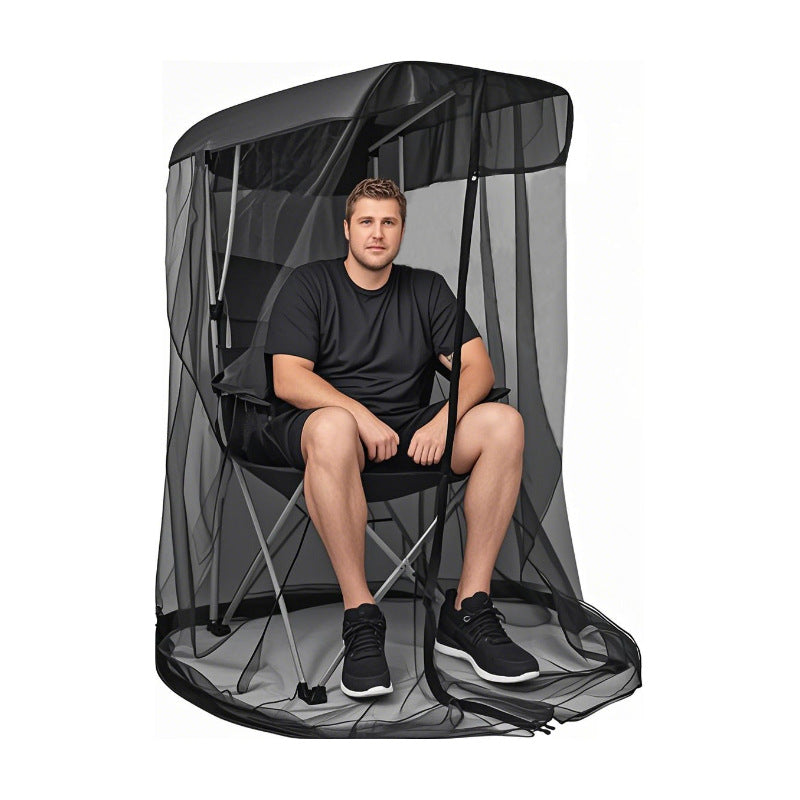 Black pop-up mosquito net tent chair with zipped mesh front and curved canopy, seated