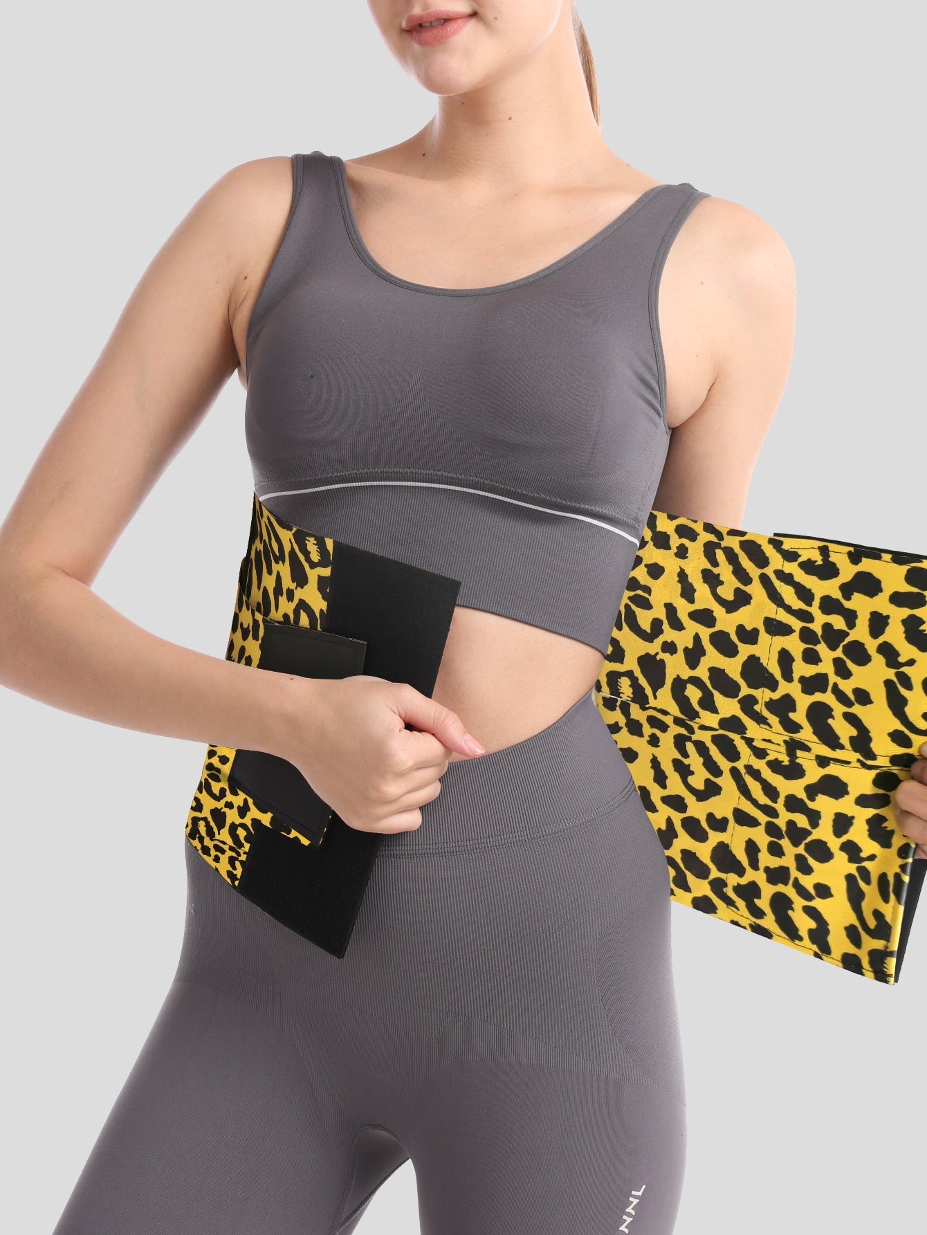 Yellow leopard waist trainer with black central panel and wrap closure