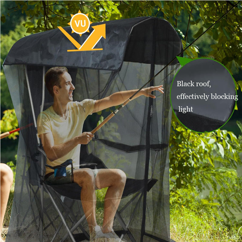 Black pop-up mosquito net tent chair with mesh roof and side panels in outdoor use