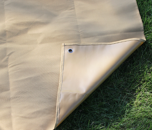 Khaki waterproof mat corner with reinforced grommet and stitched edge