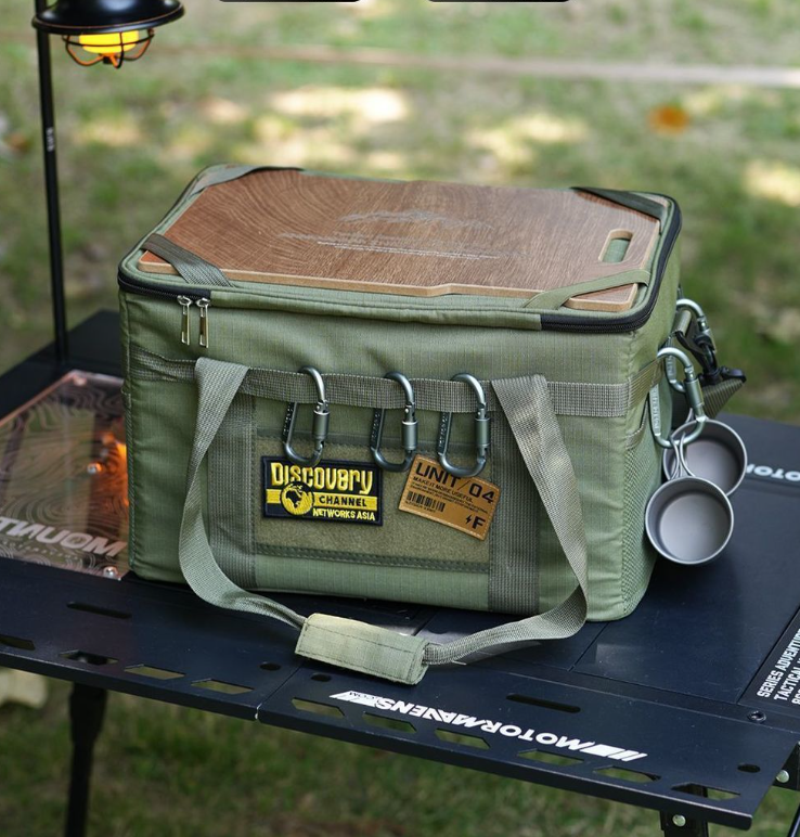 Green tactical camping storage bag with front pockets and hanging cup holders