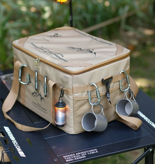 Khaki tactical storage bag open on outdoor table with divider and cup storage