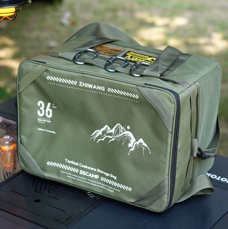 Green 36L tactical storage bag with zip closure, handles, and side straps