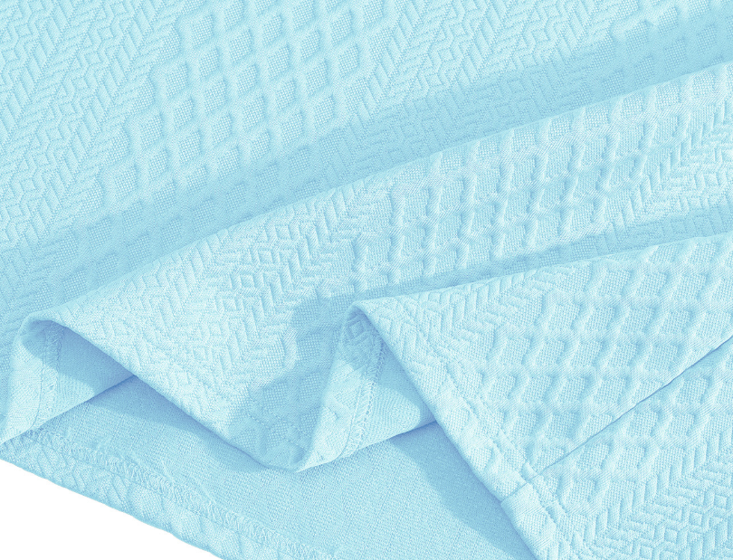 Sky blue textured shorts and polo fabric close-up