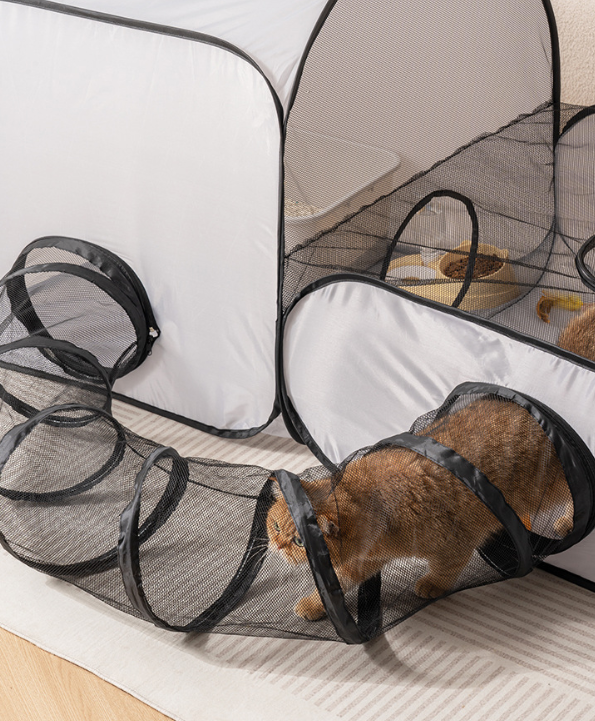 Gray pet playpen tent with tunnel tubes and mesh panels; cat inside.