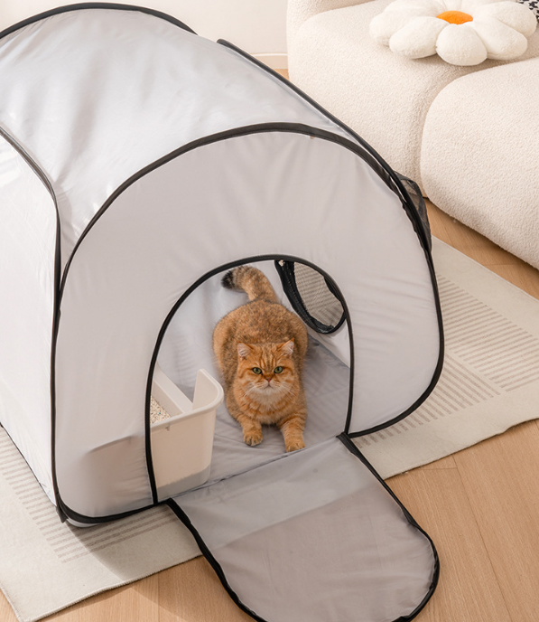 Gray pet playpen tunnel tent with circular entrance; cat peeking from inside.