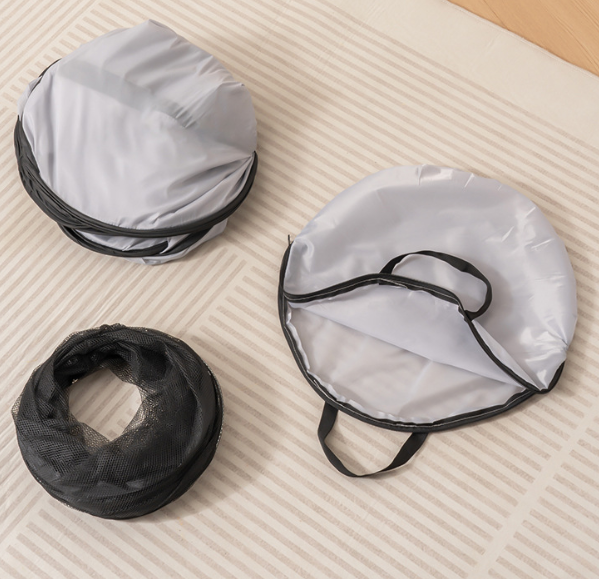 Gray pet playpen tent and tunnel mesh pieces with storage/carry bags.