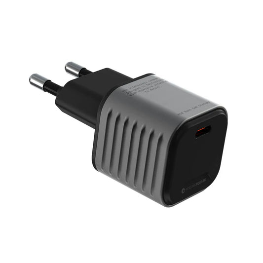 Compact black GaN wall charger with USB-C port, ribbed grip, and two round prongs