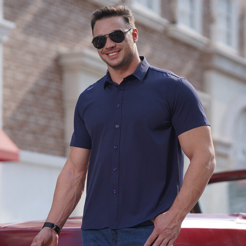 Navy men’s short-sleeve button-up business shirt with a pointed collar